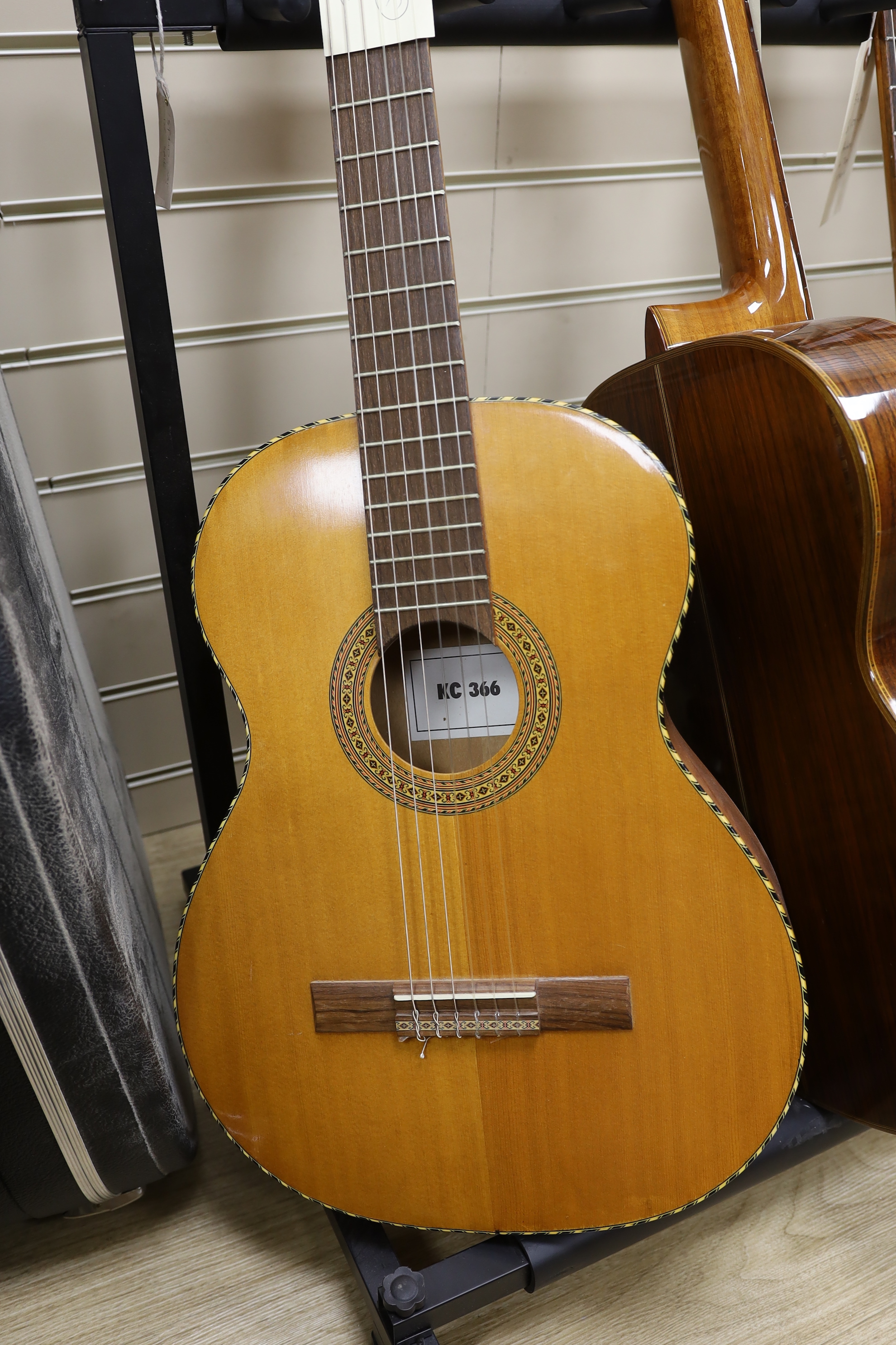 An acoustic guitar, labelled internally Antoria G 974 and two others